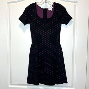 Milly Black w purple detail short sleeved fit and flare dress. Sz 12